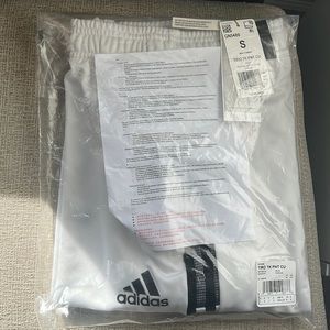 Mens White ADIDAS track pants . New in package